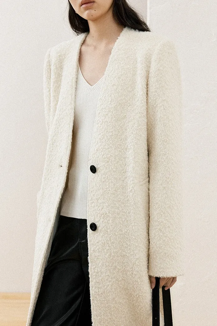 Minimalist design collarless textured coat